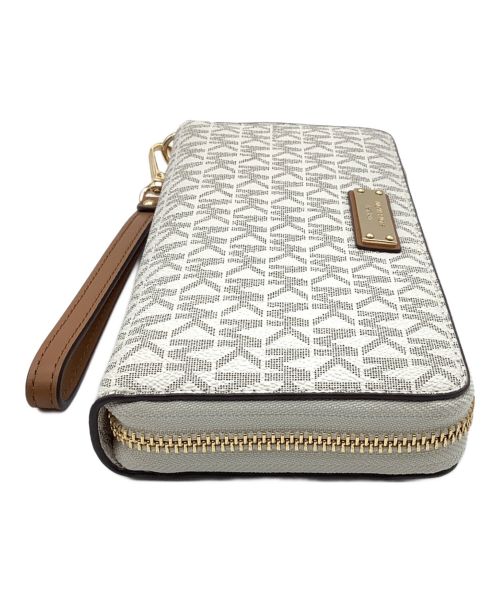 MICHAEL KORS（マイケル・コース）MICHAEL KORS (マイケルコース) ラウンドファスナー財布 アイボリーの古着・服飾アイテム