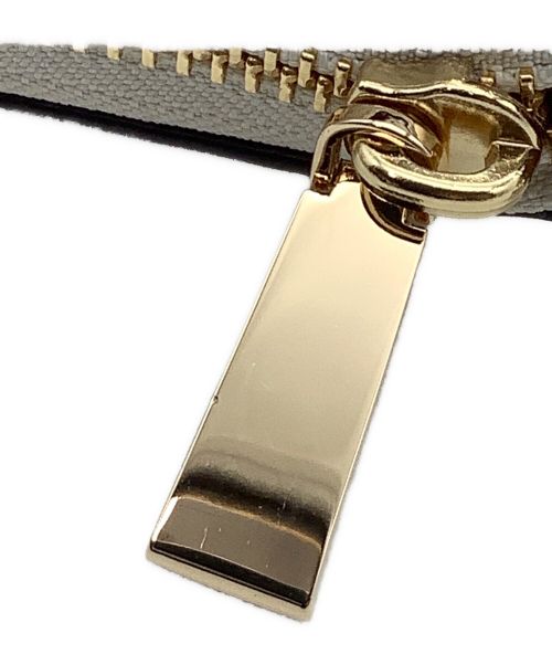 MICHAEL KORS（マイケル・コース）MICHAEL KORS (マイケルコース) ラウンドファスナー財布 アイボリーの古着・服飾アイテム