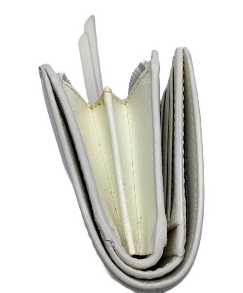 MARC JACOBS（マークジェイコブズ）MARC JACOBS (マークジェイコブス) コンパクトウォレット アイボリーの古着・服飾アイテム