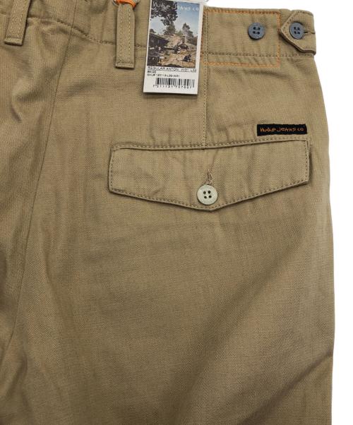 NUDIE JEANS（ヌーディー・ジーンズ）NUDIE JEANS (ヌーディー・ジーンズ) テーパードパンツ ベージュ サイズ: 76cm (W30)の古着・服飾アイテム