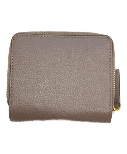 TORY BURCH（トリーバーチ）TORY BURCH (トリーバーチ) 2つ折り財布 グレーの古着・服飾アイテム