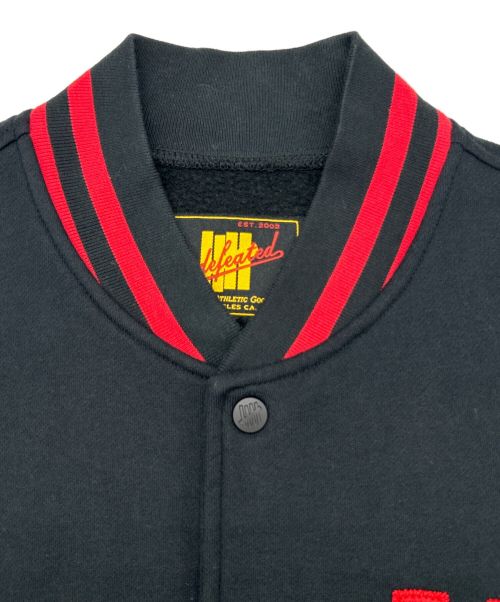 UNDEFEATED（アンディフィーテッド）UNDEFEATED (アンディフィーテッド) スタジャン ブラック×レッド サイズ:SIZE Mの古着・服飾アイテム