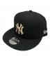 New Era（ニューエラ）の古着「キャップ」｜ブラック×ゴールド