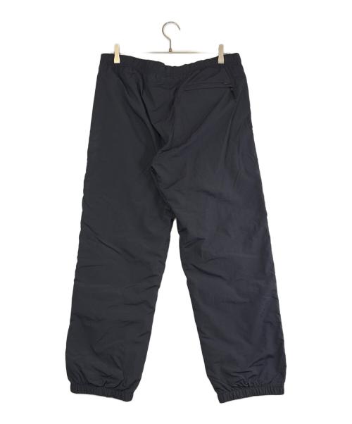 SUPREME（シュプリーム）Supreme (シュプリーム) side logo track pant（サイド・ロゴ・トラック・パンツ） ブラック×ホワイト サイズ:SIZE Mの古着・服飾アイテム