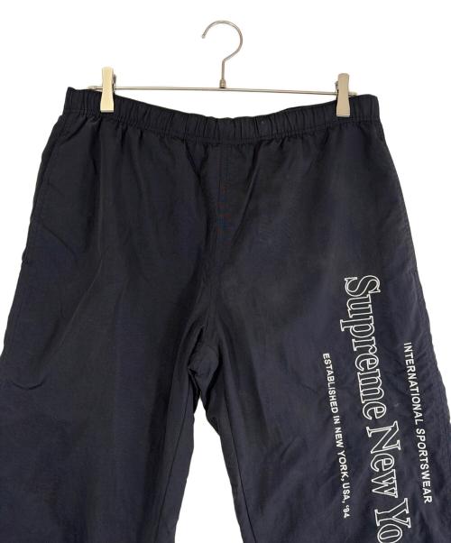 SUPREME（シュプリーム）Supreme (シュプリーム) side logo track pant（サイド・ロゴ・トラック・パンツ） ブラック×ホワイト サイズ:SIZE Mの古着・服飾アイテム
