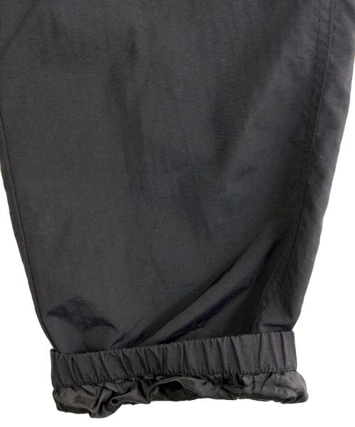 SUPREME（シュプリーム）Supreme (シュプリーム) side logo track pant（サイド・ロゴ・トラック・パンツ） ブラック×ホワイト サイズ:SIZE Mの古着・服飾アイテム