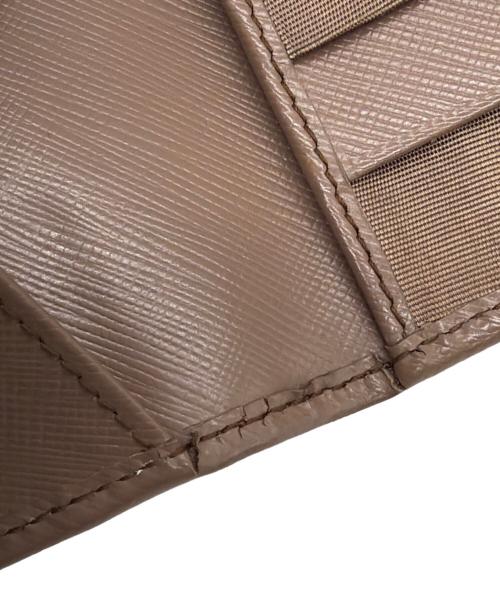 Salvatore Ferragamo（サルヴァトーレ フェラガモ）Salvatore Ferragamo (サルヴァトーレ フェラガモ) 長財布 ベージュの古着・服飾アイテム