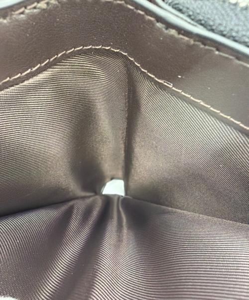 COACH（コーチ）COACH (コーチ) 2つ折り財布 ブラック×レッドの古着・服飾アイテム