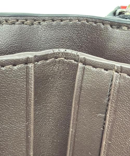 COACH（コーチ）COACH (コーチ) 2つ折り財布 ブラック×レッドの古着・服飾アイテム