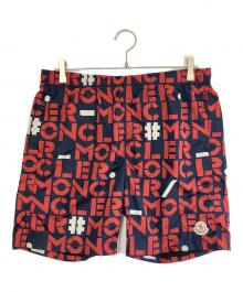 MONCLER（モンクレール）の古着「ハーフパンツ」｜ネイビー×レッド