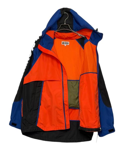 A BATHING APE（ア ベイシング エイプ）A BATHING APE (ア ベイシング エイプ) ナイロンパーカー オレンジ×ブルー サイズ:SIZE XLの古着・服飾アイテム