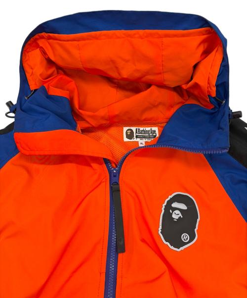 A BATHING APE（ア ベイシング エイプ）A BATHING APE (ア ベイシング エイプ) ナイロンパーカー オレンジ×ブルー サイズ:SIZE XLの古着・服飾アイテム