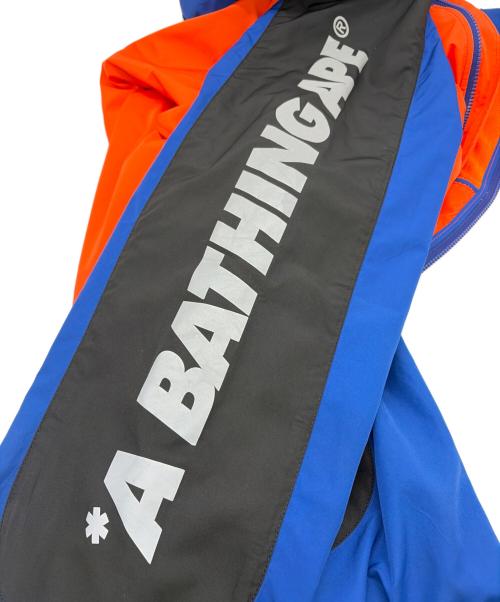 A BATHING APE（ア ベイシング エイプ）A BATHING APE (ア ベイシング エイプ) ナイロンパーカー オレンジ×ブルー サイズ:SIZE XLの古着・服飾アイテム