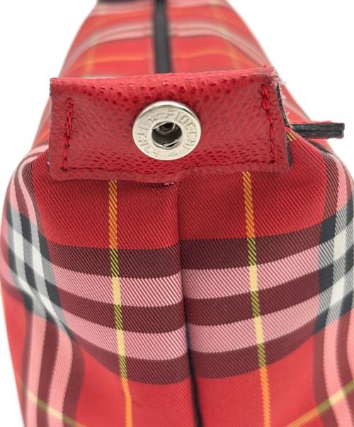 BURBERRY LONDON（バーバリーロンドン）BURBERRY LONDON (バーバリーロンドン) ハンドポーチ レッドの古着・服飾アイテム