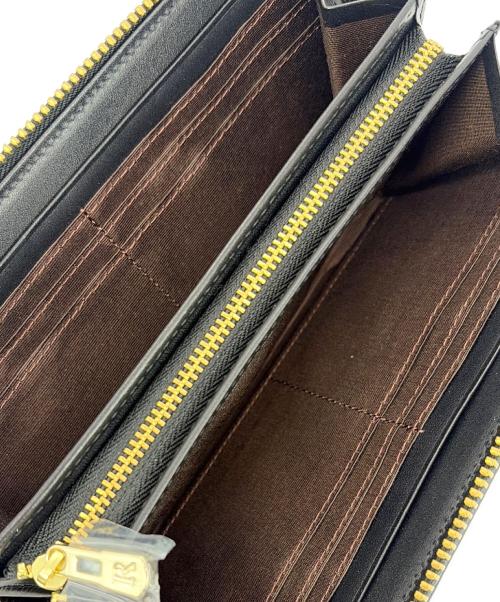 russet（ラセット）russet (ラセット) ラウンドファスナー長財布 ブラック×ネイビーの古着・服飾アイテム