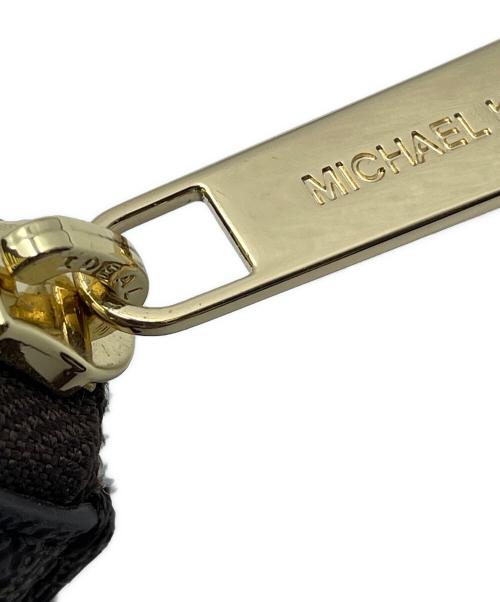 MICHAEL KORS（マイケルコース）MICHAEL KORS (マイケルコース) ラウンドファスナー財布 ブラウンの古着・服飾アイテム