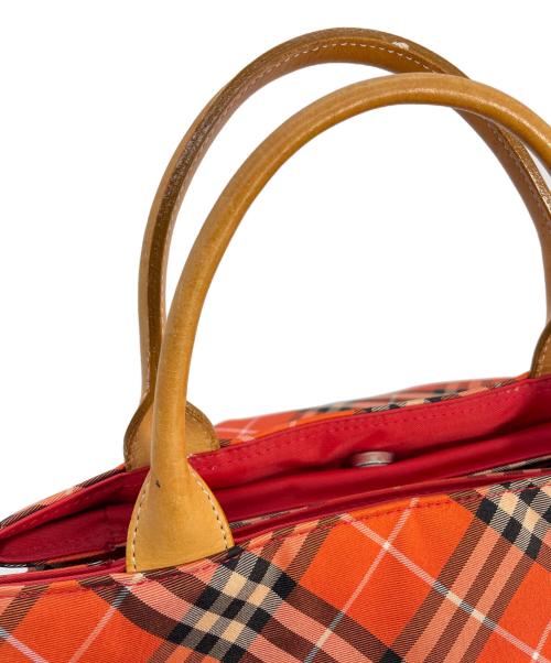 BURBERRY（バーバリー）BURBERRY (バーバリー) ハンドバッグ レッドの古着・服飾アイテム