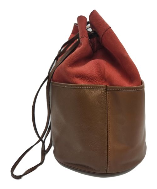 J&M DAVIDSON（ジェイ＆エム デヴィッドソン）J&M DAVIDSON (ジェイ＆エム デヴィッドソン) 巾着ショルダーバッグ レッド×ブラックの古着・服飾アイテム