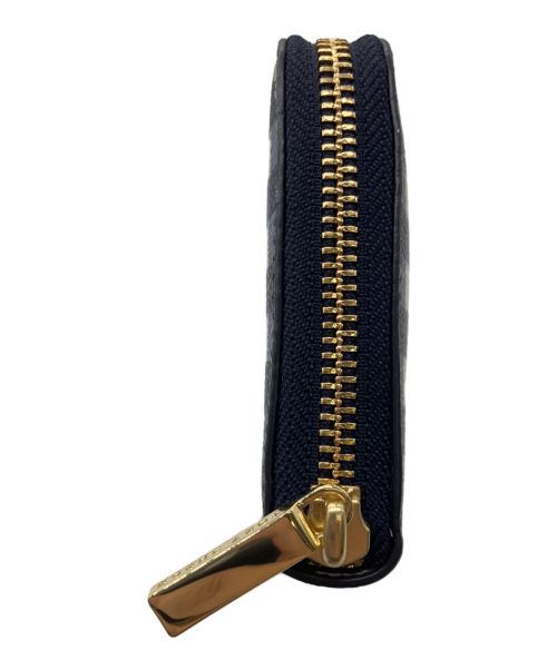 TORY BURCH（トリーバーチ）TORY BURCH (トリーバーチ) ラウンドファスナー財布 ネイビーの古着・服飾アイテム