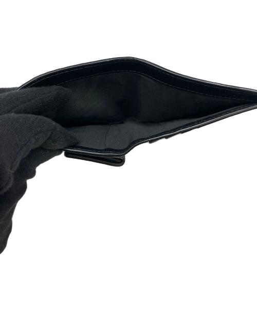 TOM FORD（トムフォード）TOM FORD (トムフォード) 型押し2つ折り財布 ブラウンの古着・服飾アイテム