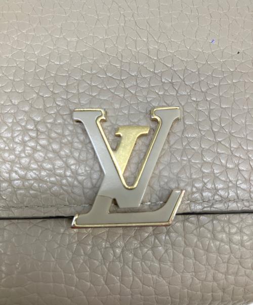 LOUIS VUITTON（ルイ ヴィトン）LOUIS VUITTON (ルイ ヴィトン) 3つ折り財布 	ポルトフォイユ・カプシーヌ コンパクト ベージュの古着・服飾アイテム