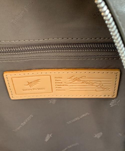 totem re vooo（トーテムリボー）totem re vooo (トーテムリボー) パンチング加工リュック グレーの古着・服飾アイテム