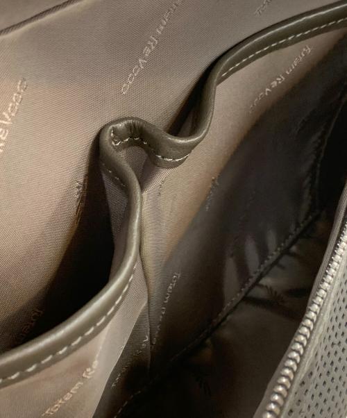 totem re vooo（トーテムリボー）totem re vooo (トーテムリボー) パンチング加工リュック グレーの古着・服飾アイテム