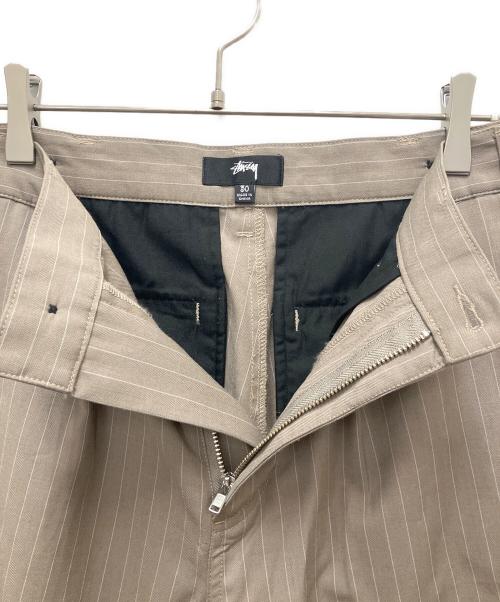 stussy（ステューシー）stussy (ステューシー) タックパンツ ベージュ サイズ:SIZE 76cmの古着・服飾アイテム