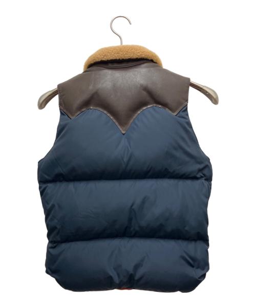 RockyMountainFeatherBed（ロッキーマウンテンフェザーベッド）RockyMountainFeatherBed (ロッキーマウンテンフェザーベッド) 16FW Christy Vest/レザー切替ダウンベスト ネイビー サイズ:7/8の古着・服飾アイテム