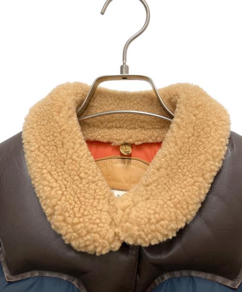 RockyMountainFeatherBed（ロッキーマウンテンフェザーベッド）RockyMountainFeatherBed (ロッキーマウンテンフェザーベッド) 16FW Christy Vest/レザー切替ダウンベスト ネイビー サイズ:7/8の古着・服飾アイテム