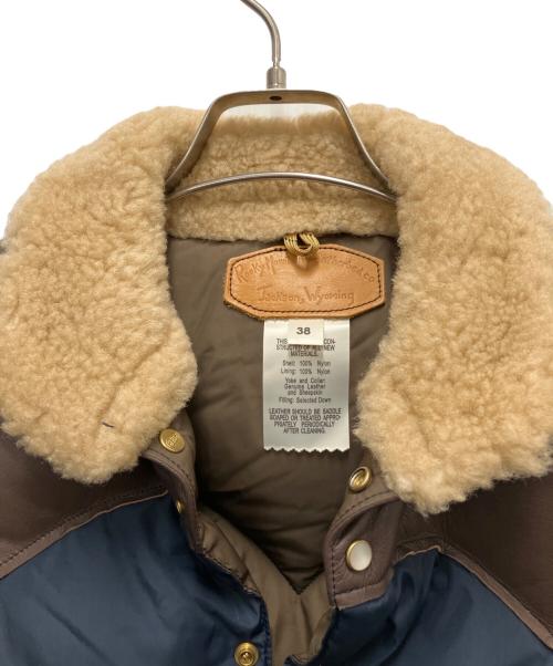 RockyMountainFeatherBed（ロッキーマウンテンフェザーベッド）RockyMountainFeatherBed (ロッキーマウンテンフェザーベッド) ダウンベスト ブラウン×ネイビー サイズ:SIZE Mの古着・服飾アイテム