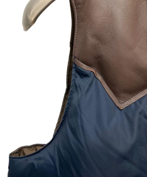 RockyMountainFeatherBed（ロッキーマウンテンフェザーベッド）RockyMountainFeatherBed (ロッキーマウンテンフェザーベッド) ダウンベスト ブラウン×ネイビー サイズ:SIZE Mの古着・服飾アイテム