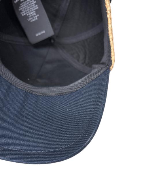 Saint Laurent Paris（サンローランパリ）Saint Laurent Paris (サンローランパリ) ベースボールキャップ アイボリー×ネイビーの古着・服飾アイテム