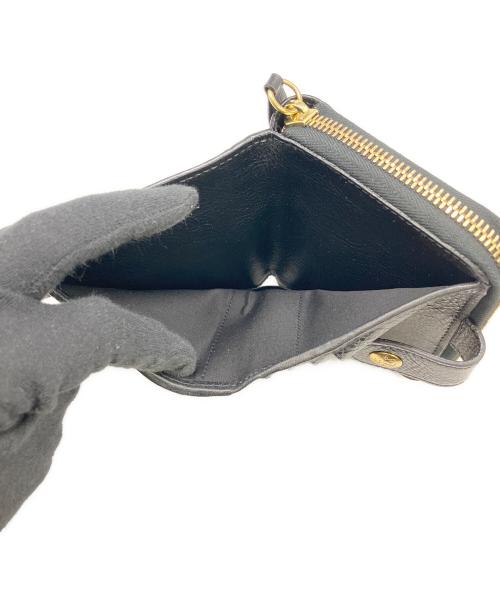 IL BISONTE（イル ビゾンテ）IL BISONTE (イル ビゾンテ) 2つ折り財布 ブラックの古着・服飾アイテム