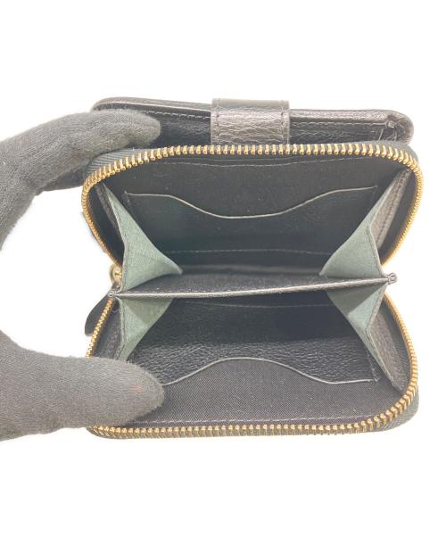 IL BISONTE（イル ビゾンテ）IL BISONTE (イル ビゾンテ) 2つ折り財布 ブラックの古着・服飾アイテム