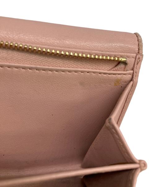 MIU MIU（ミュウミュウ）MIU MIU (ミュウミュウ) 3つ折り財布 ピンクの古着・服飾アイテム