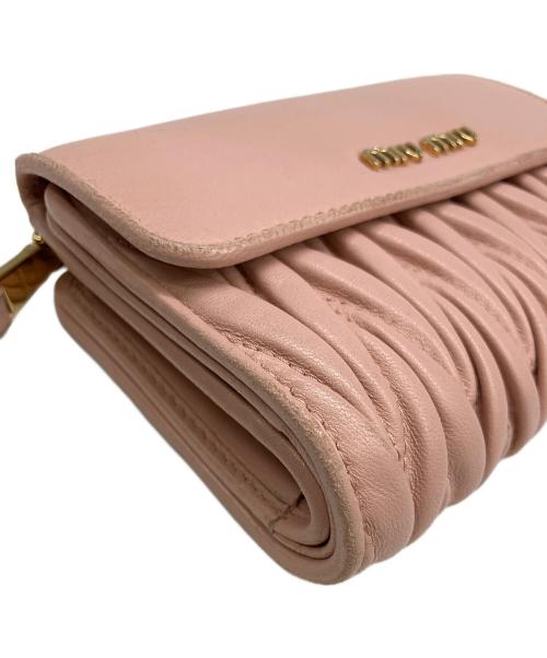 MIU MIU（ミュウミュウ）MIU MIU (ミュウミュウ) 3つ折り財布 ピンクの古着・服飾アイテム