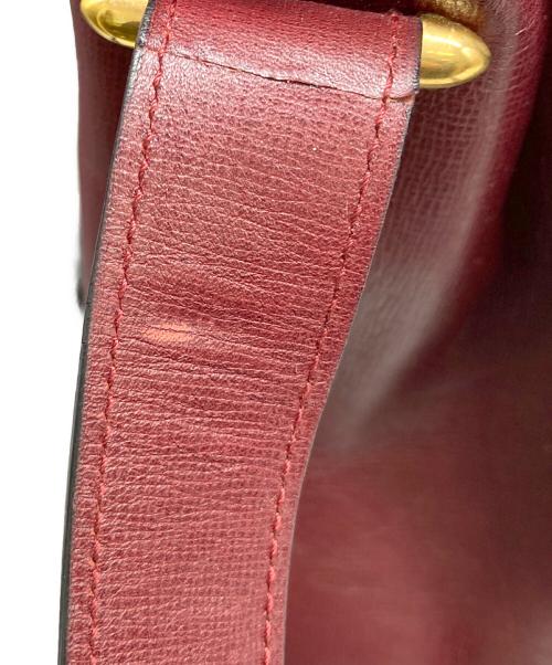 Cartier（カルティエ）Cartier (カルティエ) 巾着ショルダーバッグ ボルドーの古着・服飾アイテム