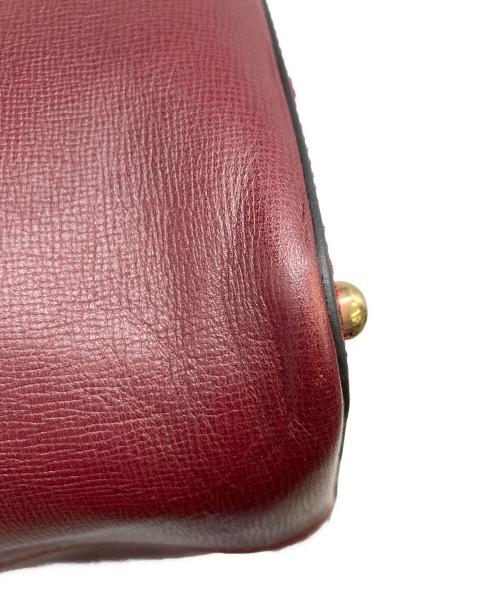 Cartier（カルティエ）Cartier (カルティエ) 巾着ショルダーバッグ ボルドーの古着・服飾アイテム