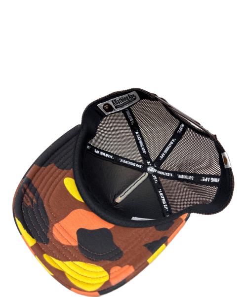 A BATHING APE（ア ベイシング エイプ）A BATHING APE (ア ベイシング エイプ) 1ST CAMO COLLEGE MESH CAP オレンジの古着・服飾アイテム