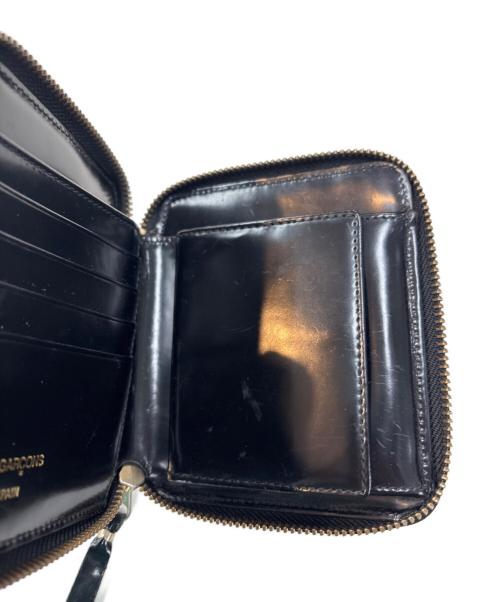 COMME des GARCONS（コムデギャルソン）COMME des GARCONS (コムデギャルソン) ラウンドファスナー財布 ブラックの古着・服飾アイテム