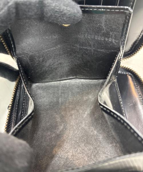 COMME des GARCONS（コムデギャルソン）COMME des GARCONS (コムデギャルソン) ラウンドファスナー財布 ブラックの古着・服飾アイテム