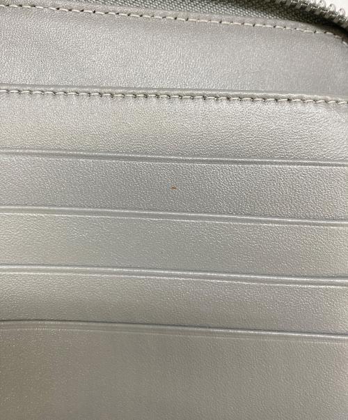 COMME des GARCONS（コムデギャルソン）COMME des GARCONS (コムデギャルソン) 2つ折り財布 グレーの古着・服飾アイテム