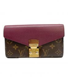 LOUIS VUITTON（ルイ ヴィトン）の古着「長財布　ポルトフォイユ・パラス」｜ブラウン×レッド