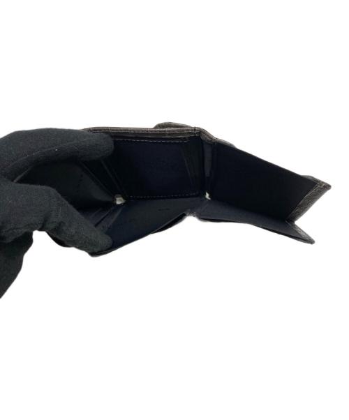 EXENTRI（エキセントリ）EXENTRI (エキセントリ) コンパクトウォレット カイマングレーの古着・服飾アイテム