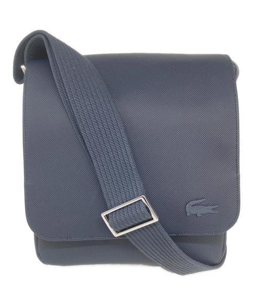 LACOSTE（ラコステ）LACOSTE (ラコステ) スリムフラップサッチェルバッグ ネイビーの古着・服飾アイテム