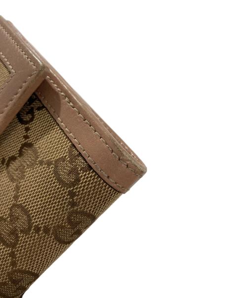 GUCCI（グッチ）GUCCI (グッチ) 2つ折り財布　GGキャンバスの古着・服飾アイテム