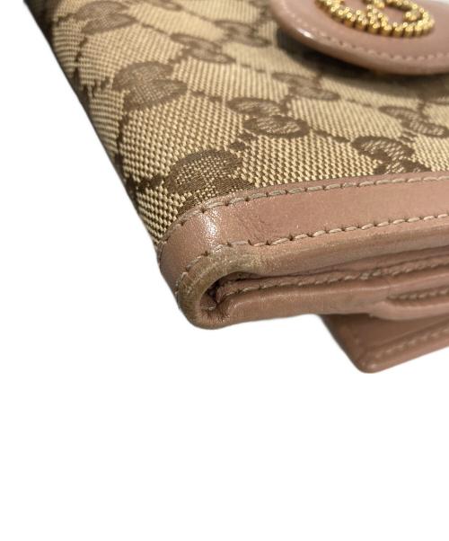 GUCCI（グッチ）GUCCI (グッチ) 2つ折り財布　GGキャンバスの古着・服飾アイテム