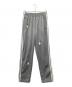 adidas originals（アディダスオリジナル）の古着「モノグラムファイヤーバードトラックパンツ」｜グレー