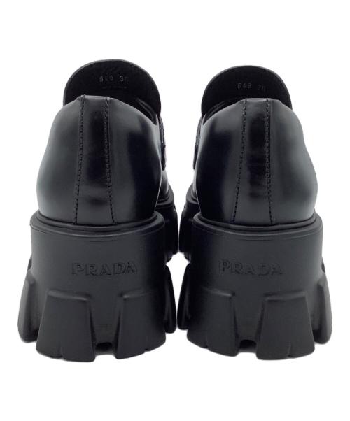 PRADA（プラダ）PRADA (プラダ) ブラッシュドレザーモノリスローファー ブラック サイズ:36の古着・服飾アイテム
